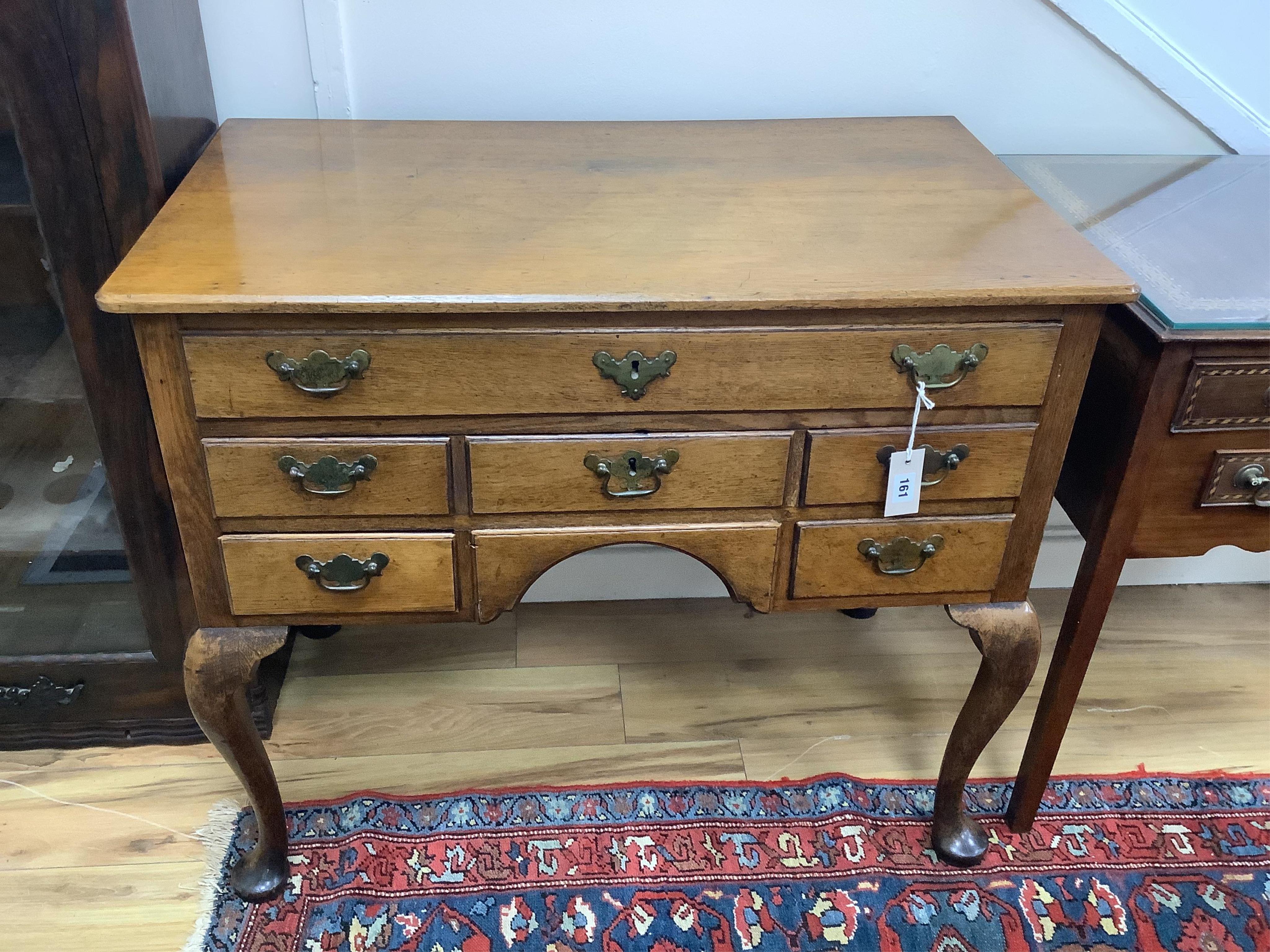 A George III oak six drawer architect's table with hinged rectangular top, width 90cm, depth 53cm, height 78cm. Condition - good